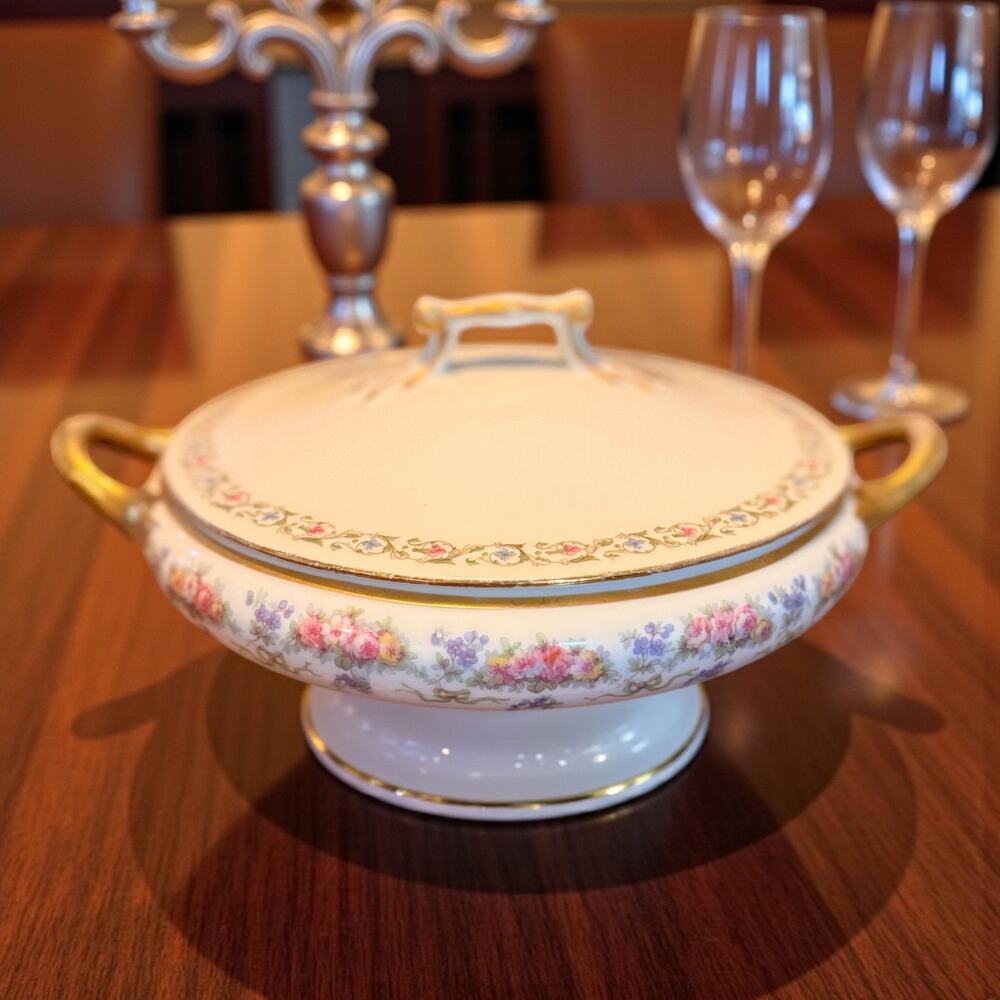 J. Pouyat Limoges France covered tureen with floral pattern and gold accents.